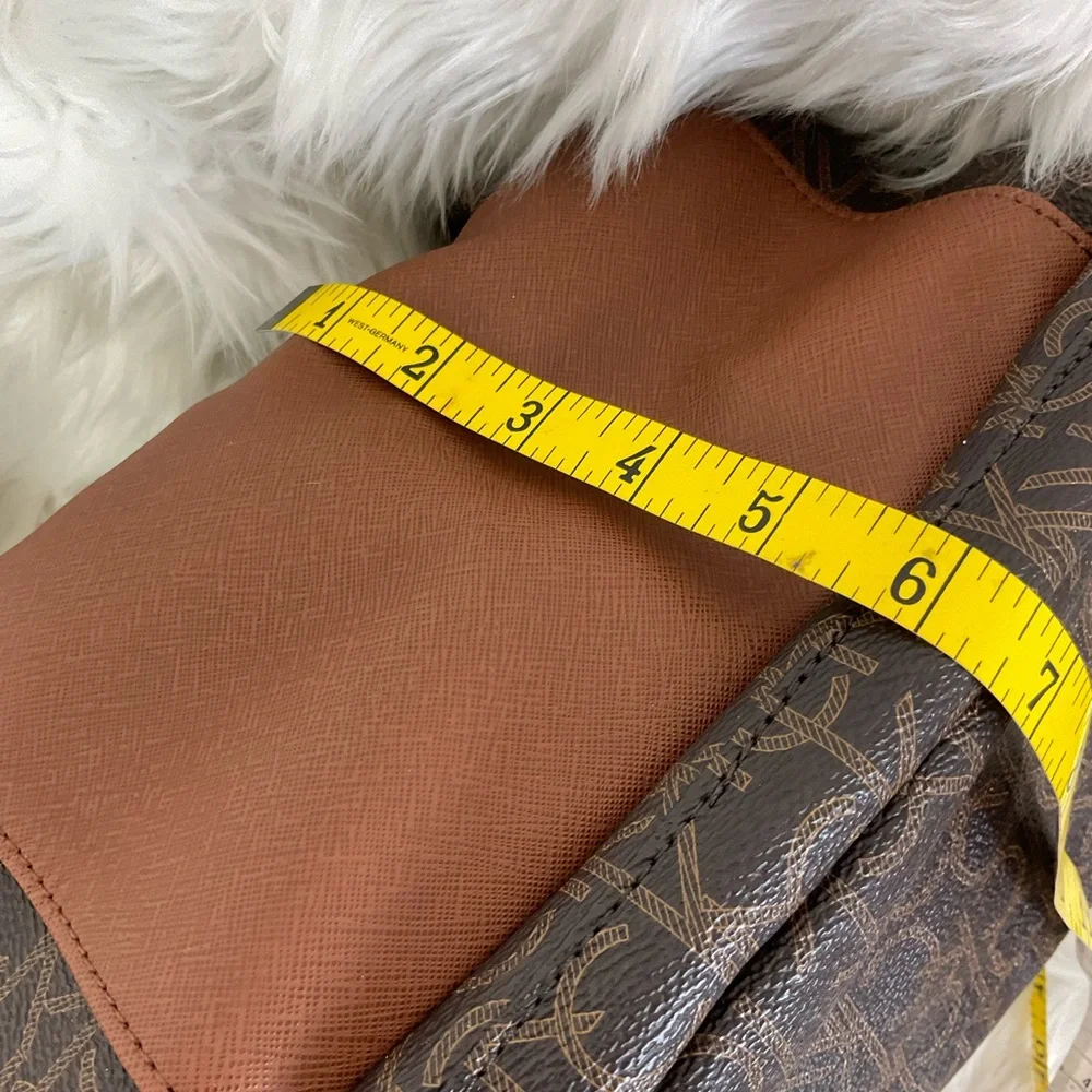Calvin Klein Women's Medium Brown Monogram Faux Leather Backpack